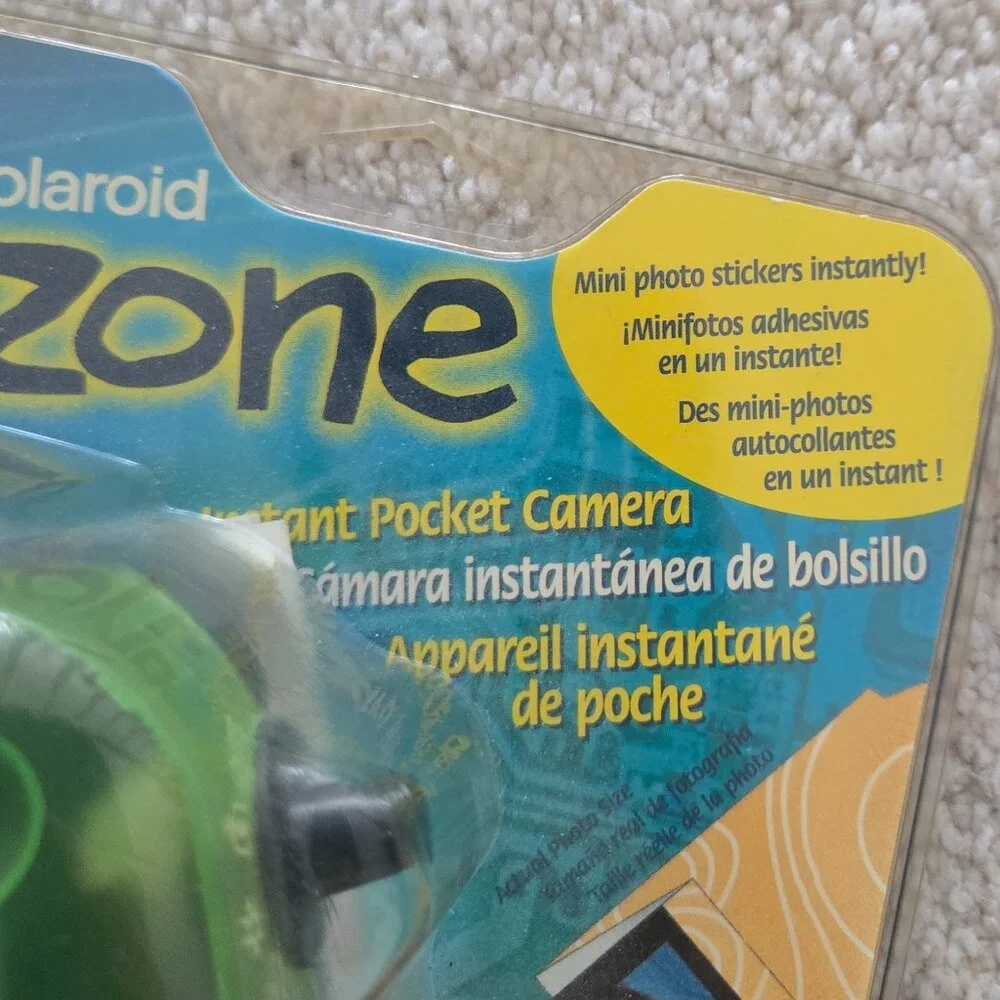Green vintage izone polaroid camera